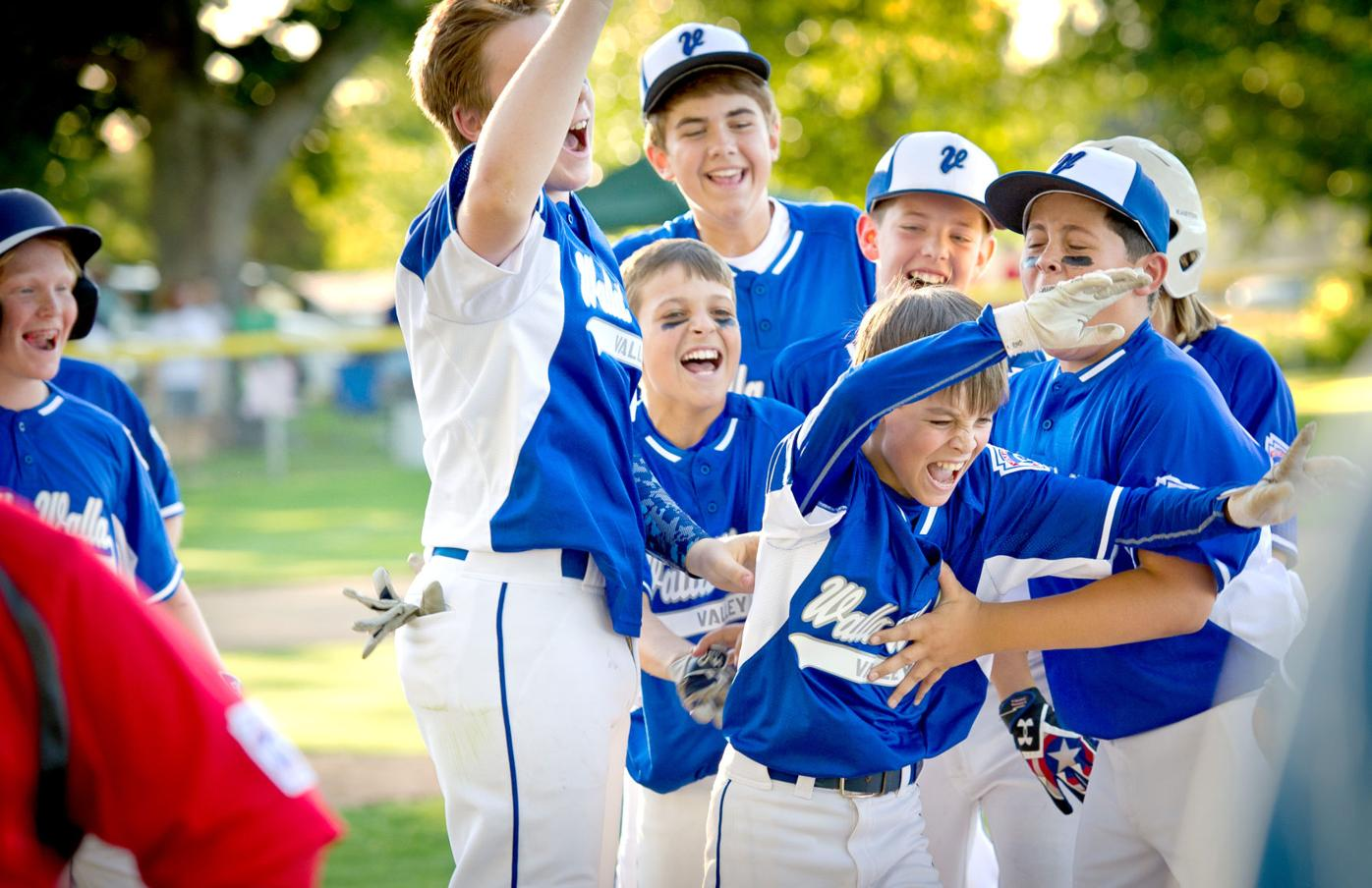 Baseball team celebrating together